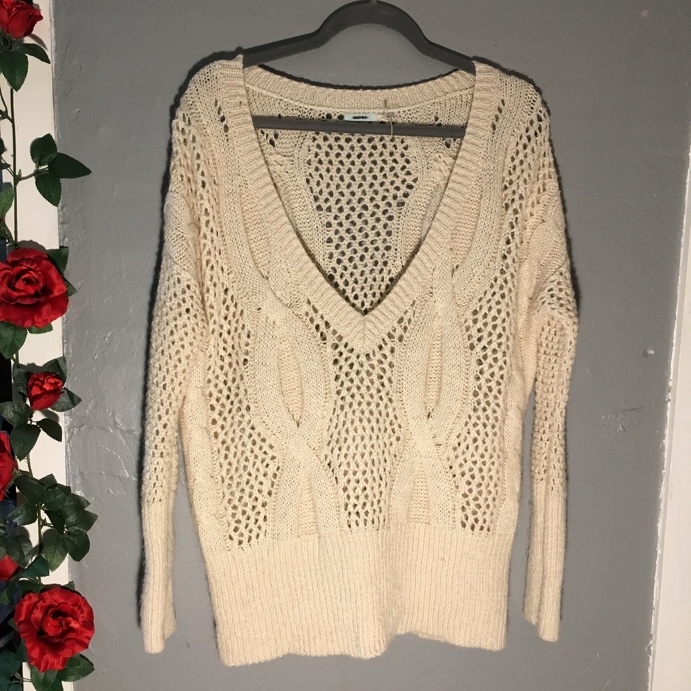 Holy cream sweater that goes off the shoulder